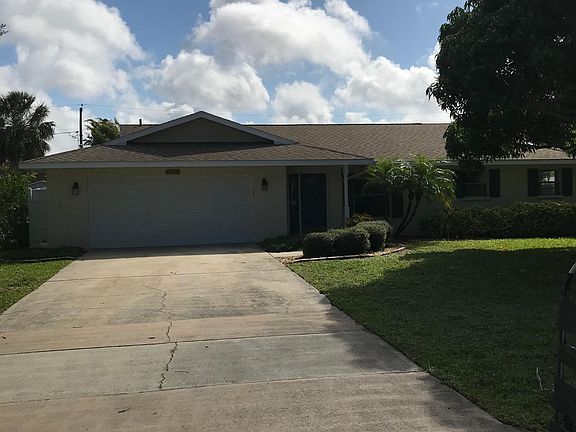 Front of house, two car garage