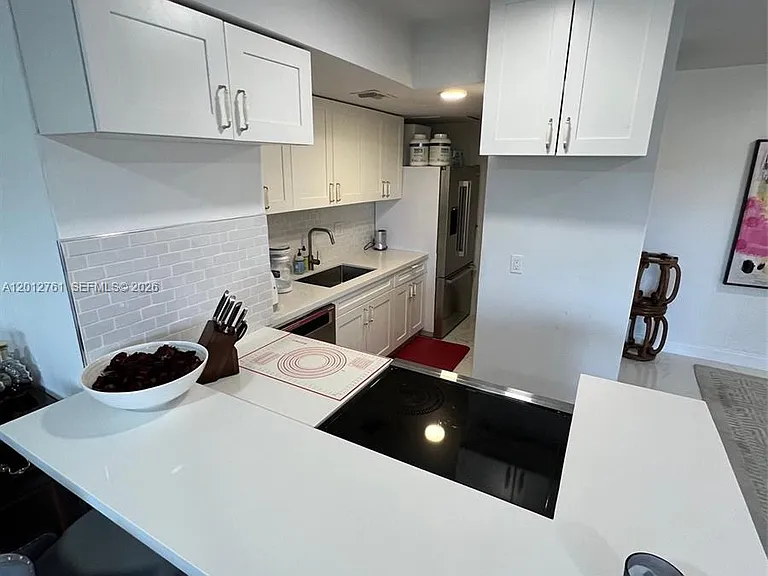 880 NE 69th St #11M — Photo 13