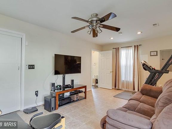 BASEMENT REC ROOM W CERAMIC TILE