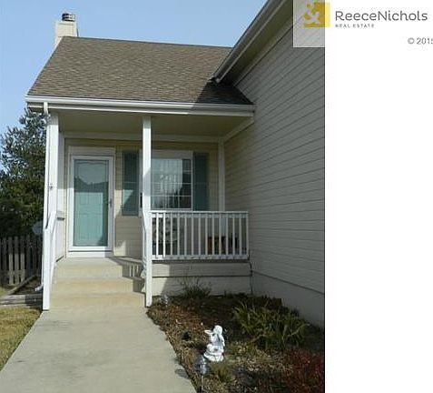 Nice sidewalk and porch to enjoy the easy to care for yard!