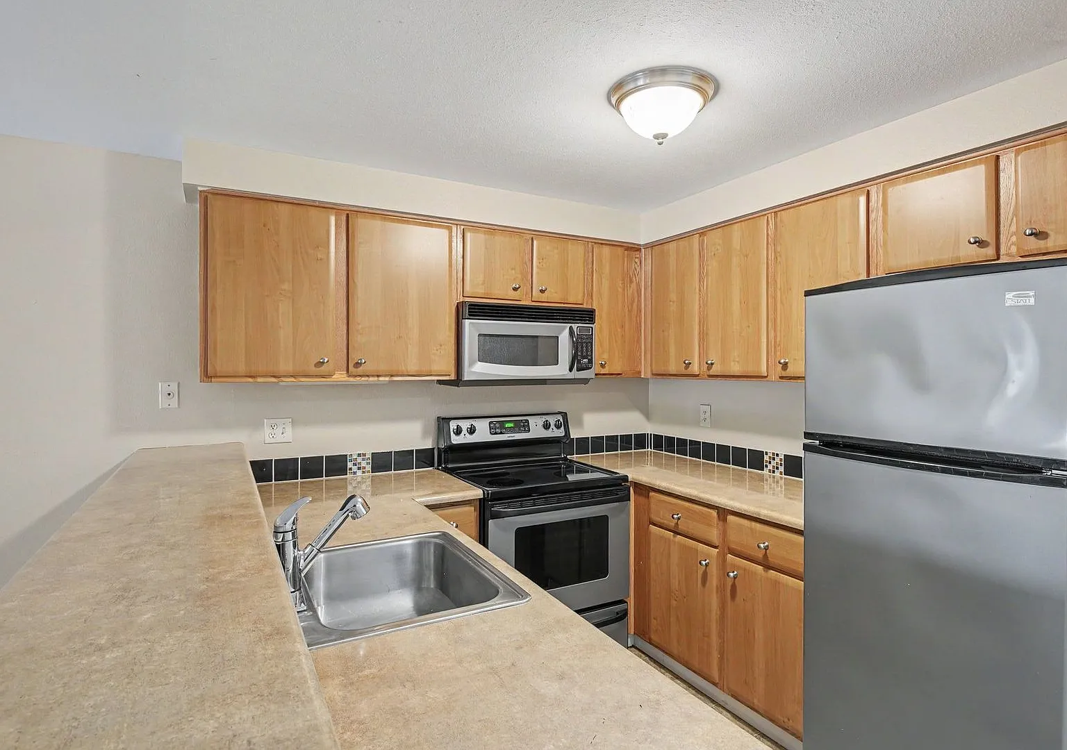 Charming Ground-Floor Condo in the Heart of Greenwood! $1,700 only!! August move in! — Photo 1