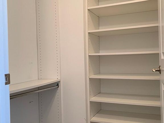 One of Two Walk-in Master Bedroom closets.