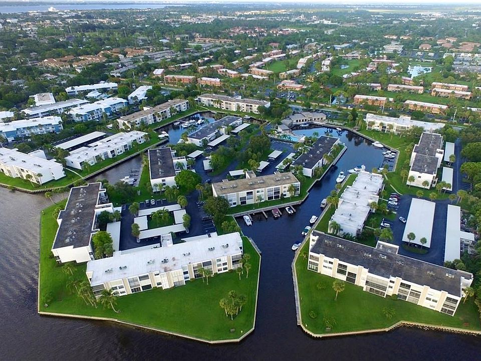 Aerial View of Circle Bay Yacht Club. Bldg 11 is just past the riverfront buildings in the Center and has the first 3 boats in t