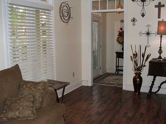 Gorgeous tilework and faux finish mantle.  Fireplace has been sealed, but you could add ventless gas logs if desired - more energy efficient than a wood burning fireplace.