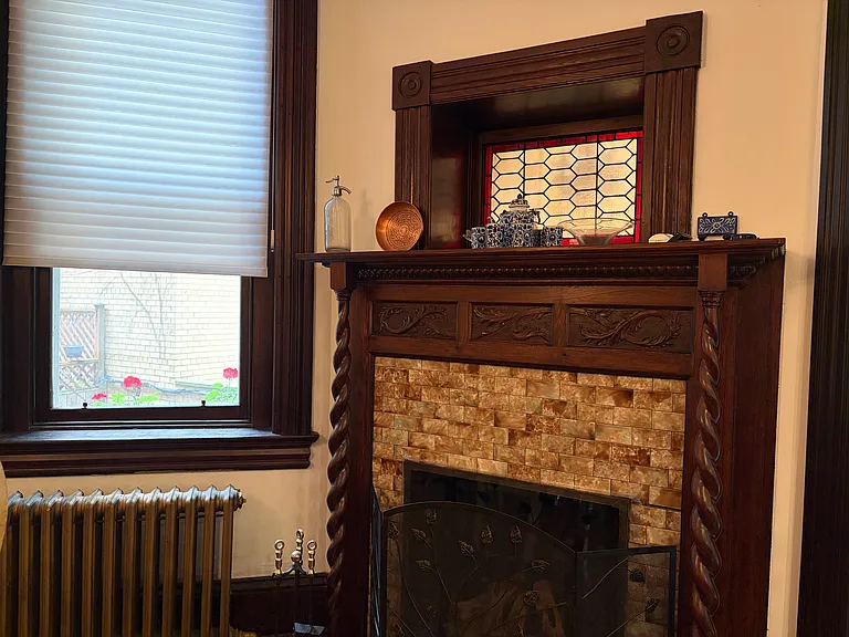 Kitchen original fireplace converted to gas