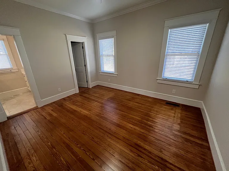 Master bedroom with custom built walk-in closet