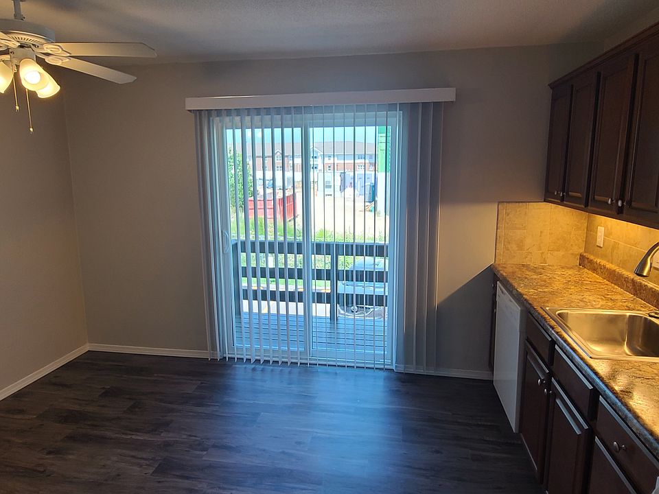 Large eat-in kitchen with private deck.