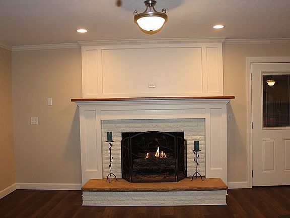 Solid oak mantle, gas logs