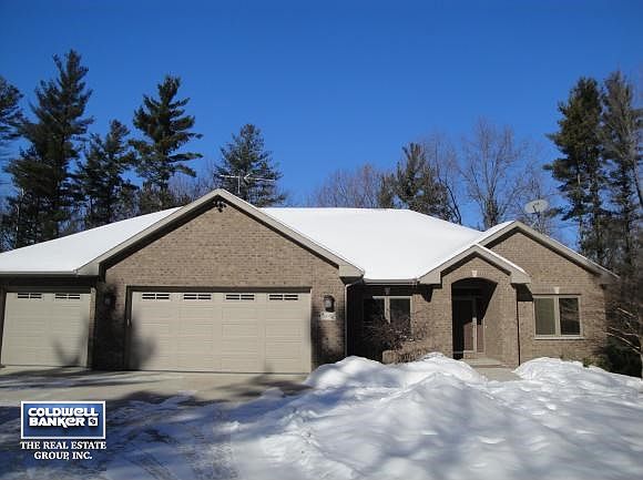 CUSTOM RANCH ON 9+ WOODED ACRE