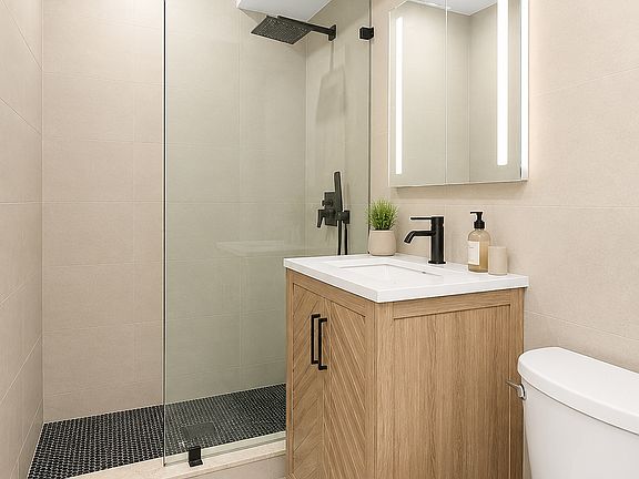 5th image of 228 E 25th St APT 11