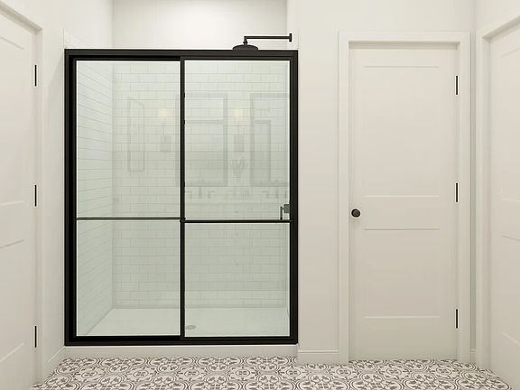 Primary bath with glass-shower enclosure