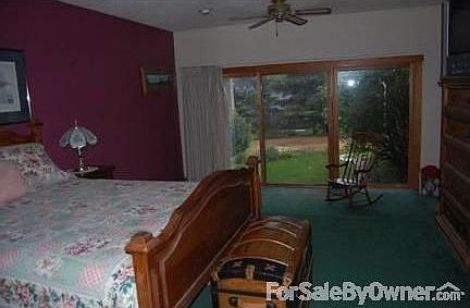 Master bedroom
						:
						Has separate sitting area and sliding door to outdoors. Master bath is adjacent