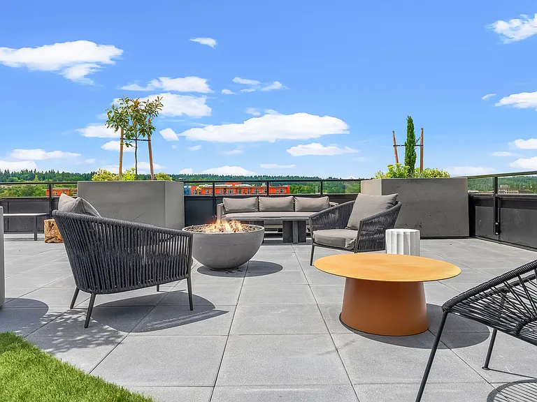 Embrace urban vibes: Rooftop firepit and stylish seating_a perfect blend of warmth and contemporary cool ____