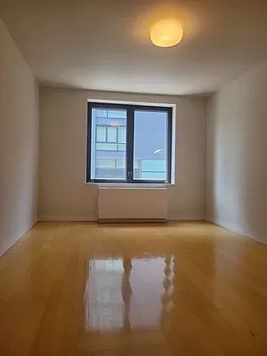 2nd image of 252 E 2nd St APT 2C