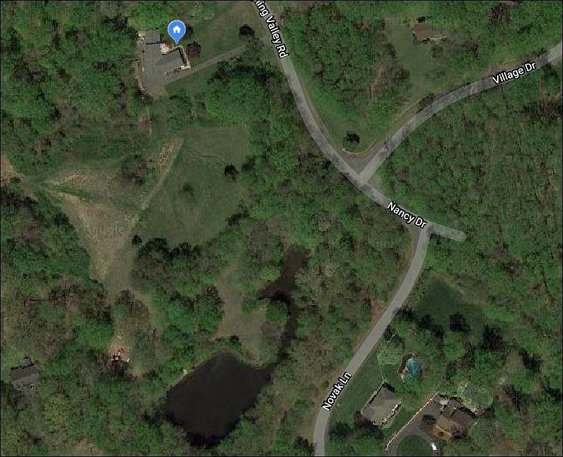 The apartment faces a large park with a pond. Wegmans is on