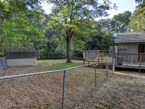 Spacious yard with shed