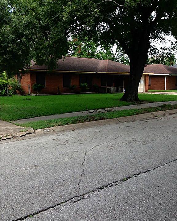 Beautiful shade tree gives this home curb appeal and help keep home cool in summer