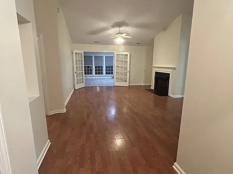 Livingroom w/fireplace into 2nd living room and/or sunroom