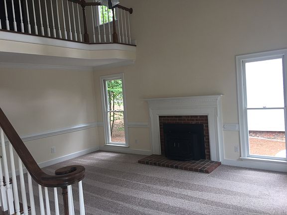 Living room w/ wood stove fp