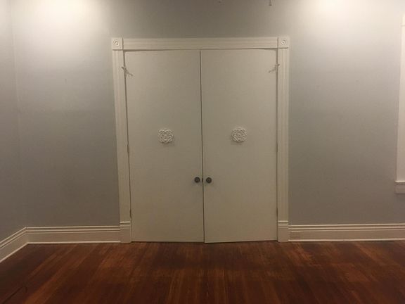 Period details, high ceilings, decorative trim.