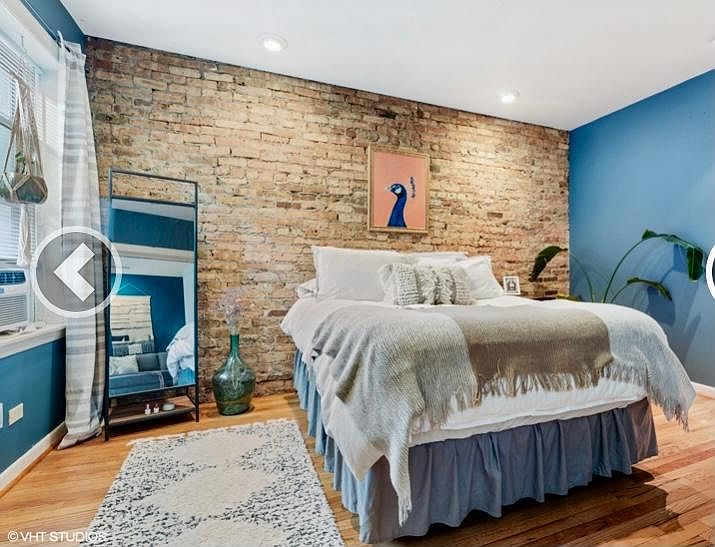 Master bedroom fits queen bed with two nightstands. (blue wall on right is now a wall to wall closet) Floors are now stained dark walnut (not shown here but in updated pics with greyish walls)