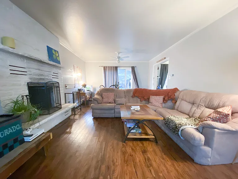 Living room area (shown furnished but comes unfurnished)