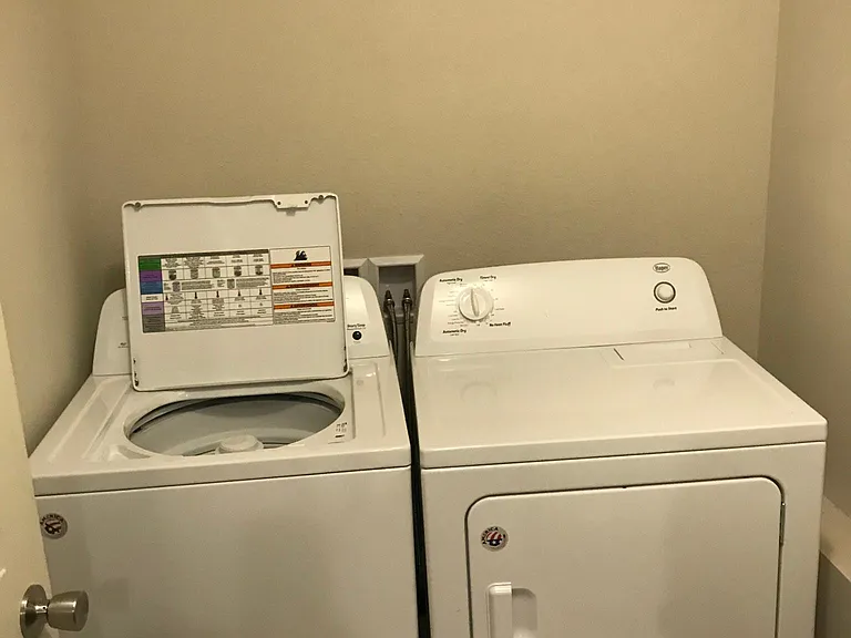 Washer dryer in laundry room