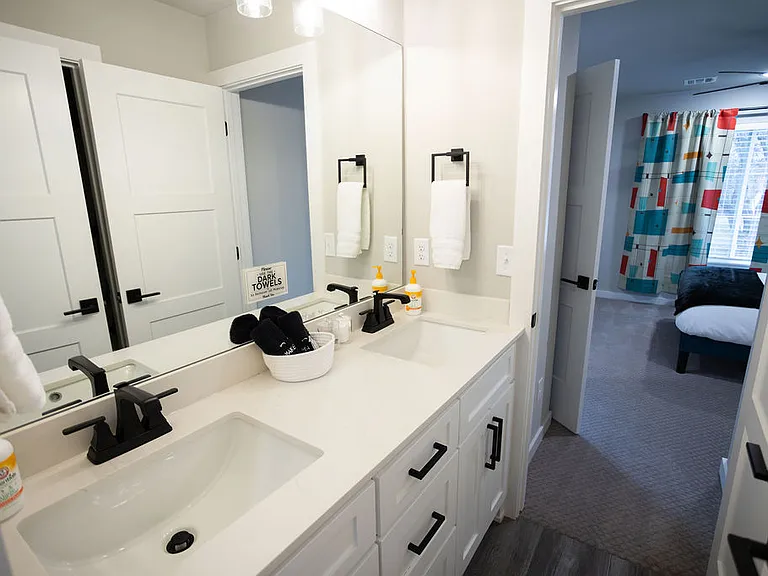 Jack and Jill bathroom with dual sinks