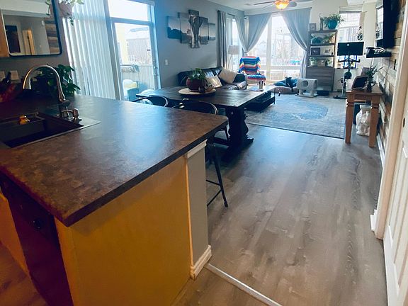 large living space standing in the kitchen