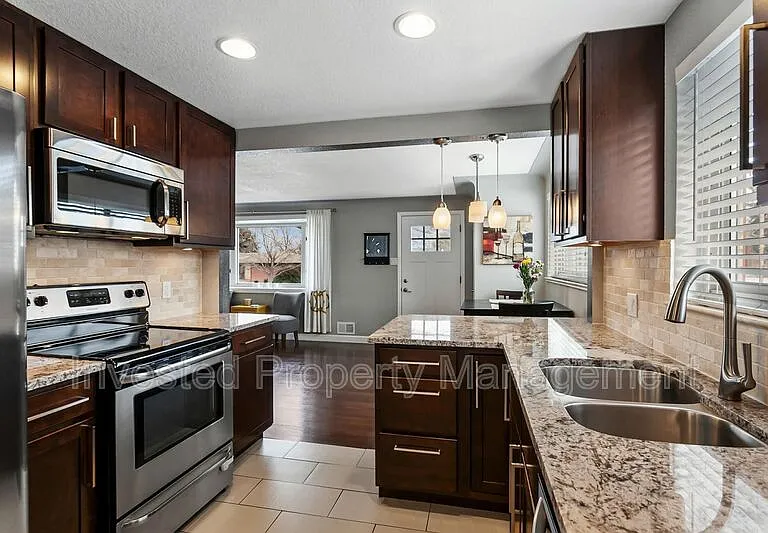 2591 S Raleigh St — Photo 4