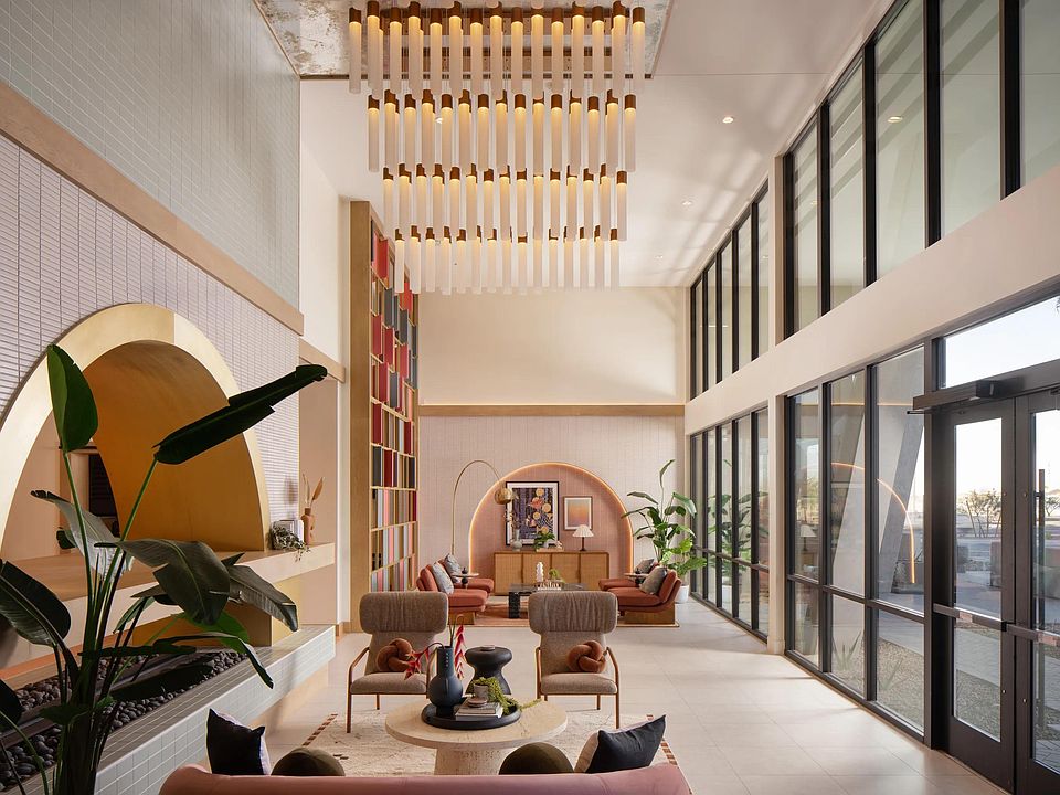 Soaring ceilings, curated desert details, and light-filled spaces set the tone at Modera Rio Salado.