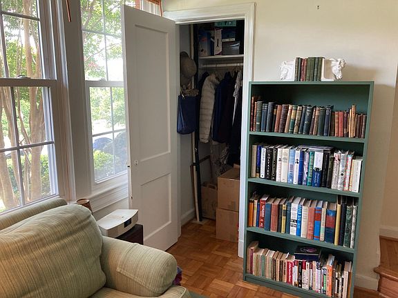 Roomy coat closet in living room.