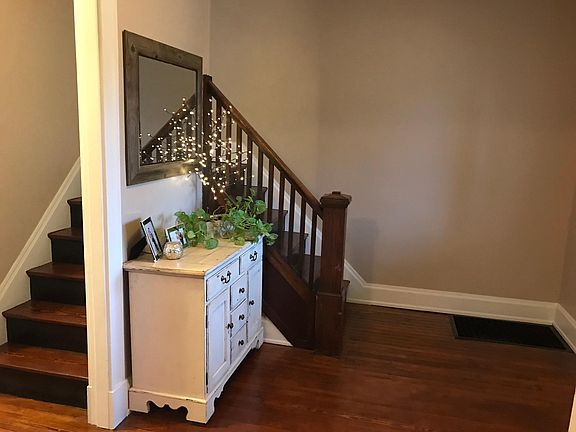 Front entry with double staircase