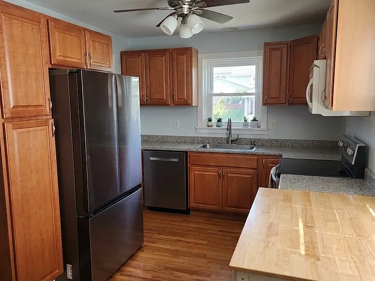 6956 W Keeney St — Photo 3