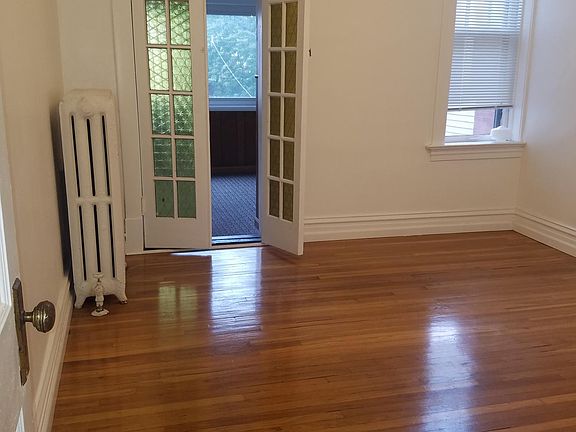 Master Bedroom with bonus room beyond double doors.
