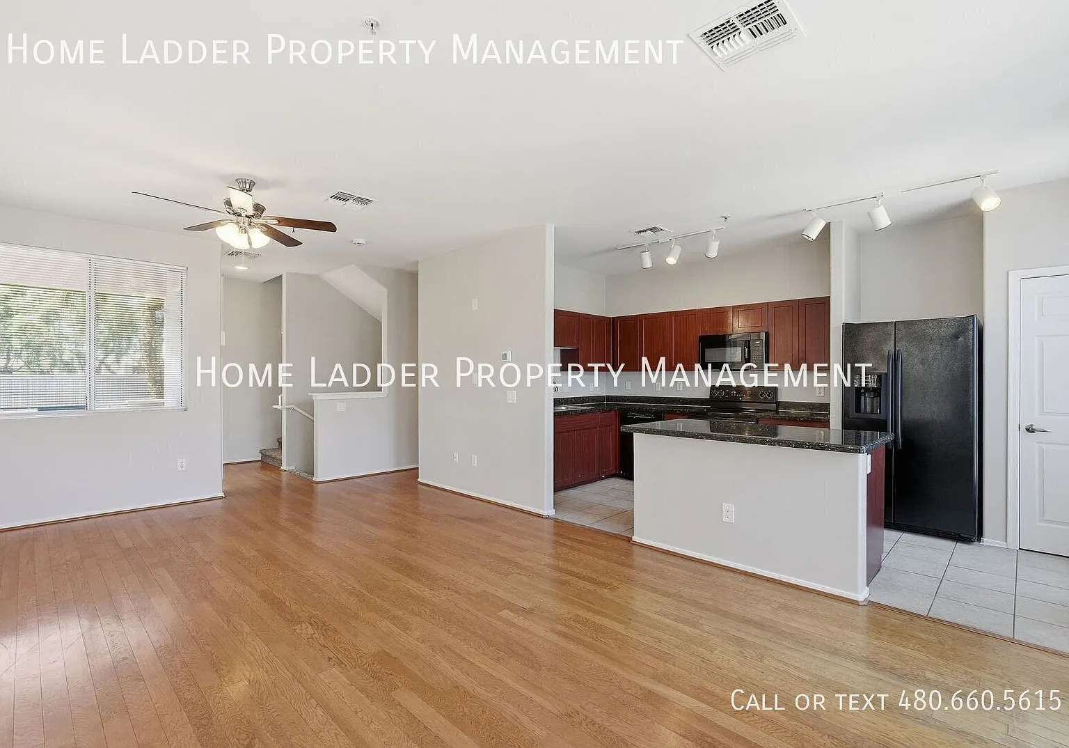 A Bright Townhome with Private Outdoor Space and a 2-Car Garage — Photo 1