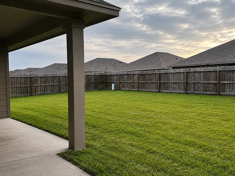 Covered patio and backyard space