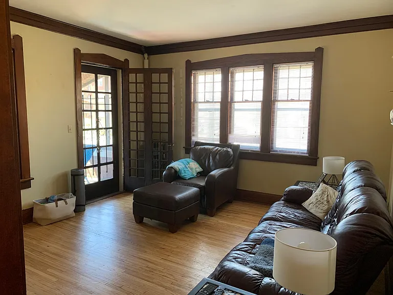 Sunny living room - with door that goes out to screen porch