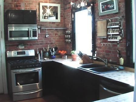 Kitchen stainless steel appliances - very sunny