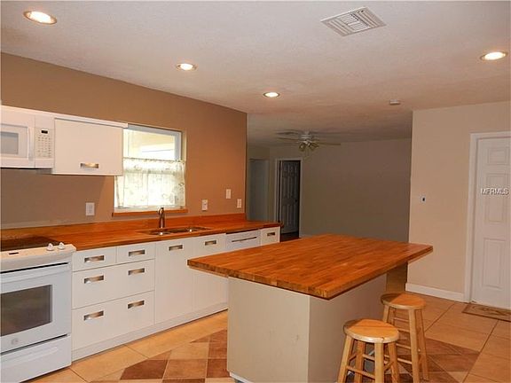 Kitchen opens to Family Room