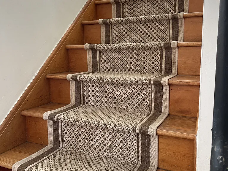 Hardwood stairs leading to second floor