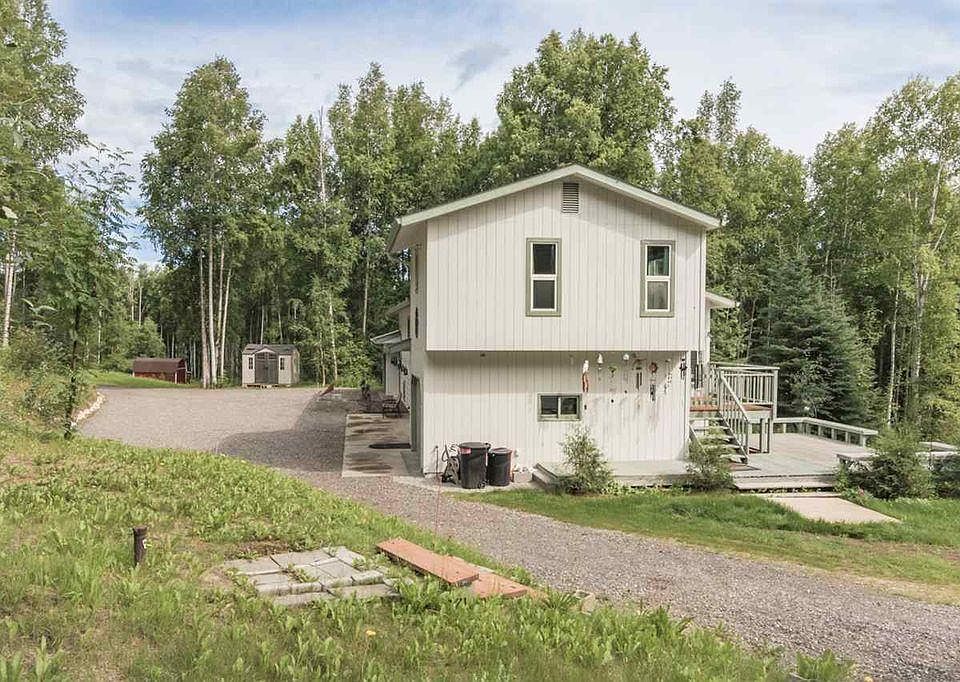 Bottom window is garage, Top windows are the master suite.