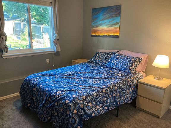 Main level bedroom (full-size bed, small desk, full size dresser, night-stand)