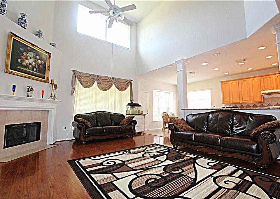 Den w/ Open Ceiling and lots of windows