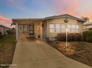 703 Amaryllis Dr, Barefoot Bay, FL 32976