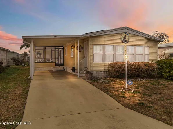 703 Amaryllis Dr, Barefoot Bay, FL 32976