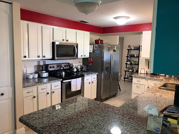 ALL NEW STAINLESS STEEL APPLIANCES ALSO, WASHER AND DRYER