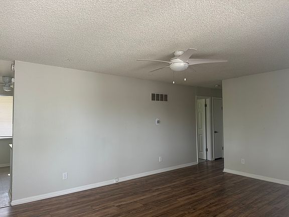 Living room. No more popcorn ceiling