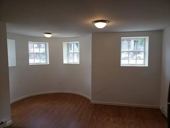 Living room with four windows.