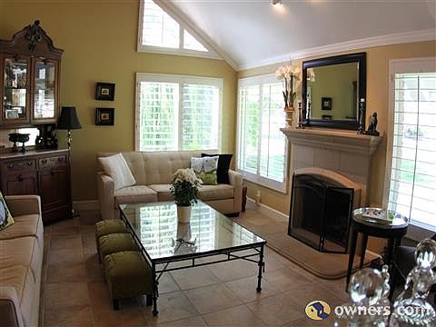 Living room/ plantation shudders/ oak staircase